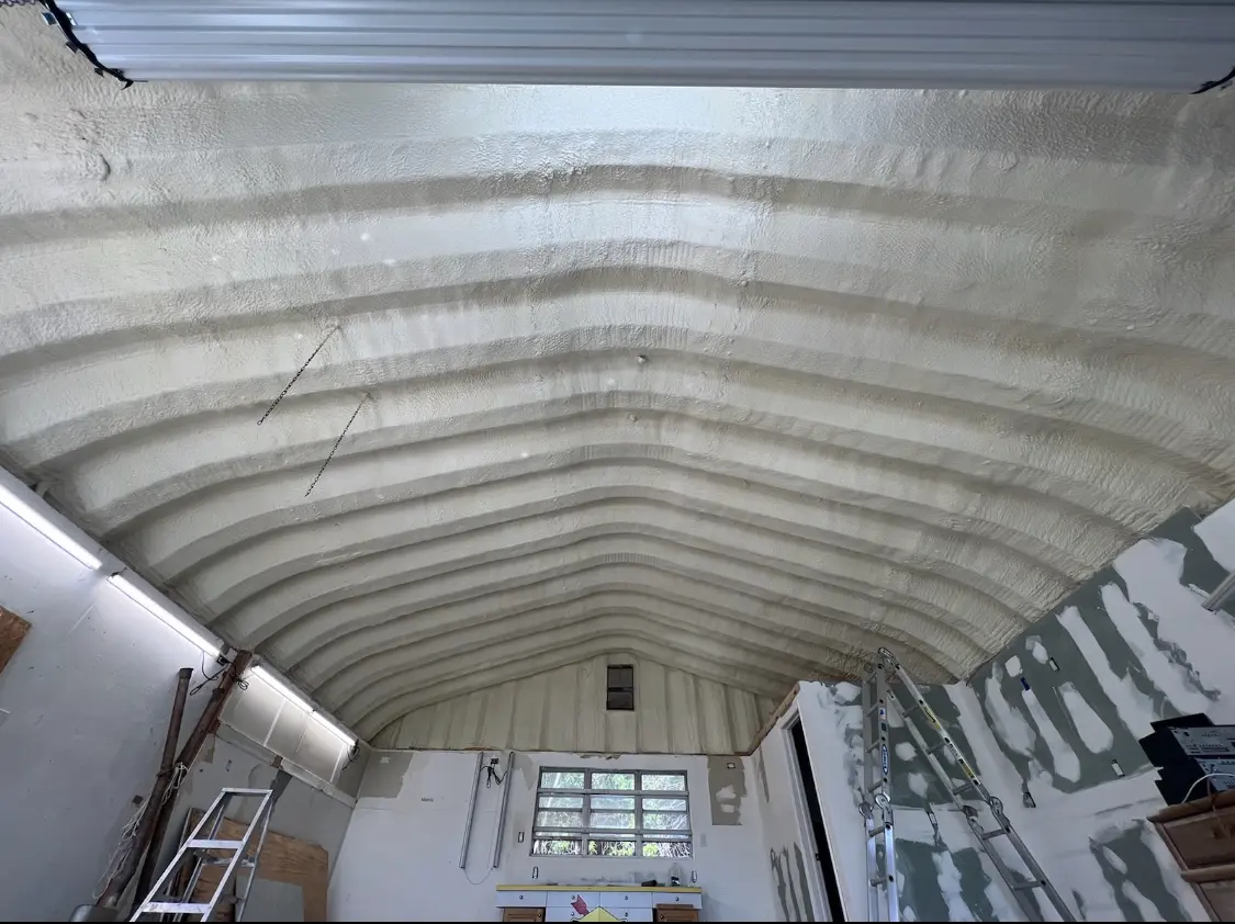 Spray polyurethane foam applied to the underside of a metal roof deck in La Riviera